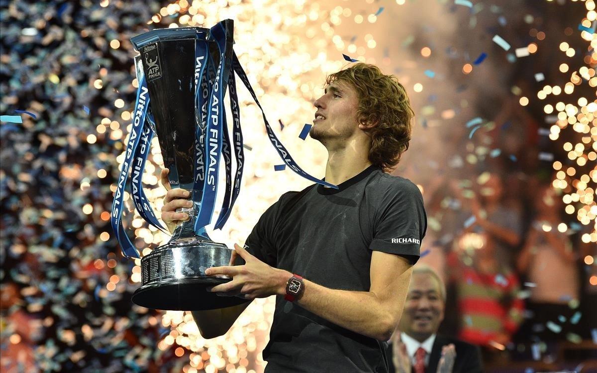 lmendiola45950888 germany s alexander zverev holds up the trophy after beating181118211321