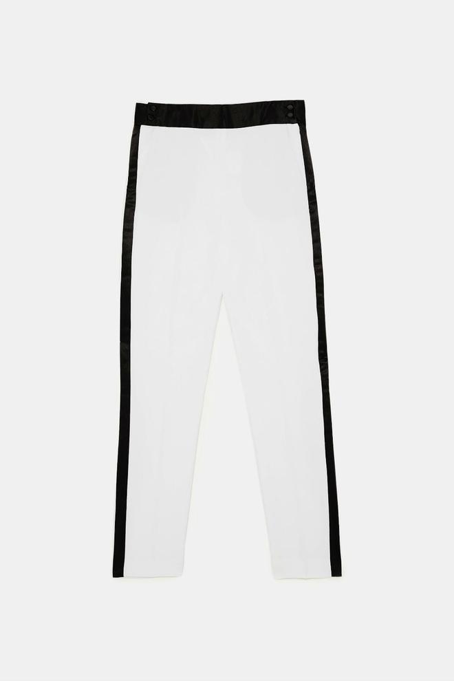 Pantalón blanco y negro de Zara. Precio: 29.95 euros