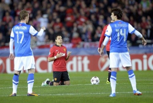 Manchester United's Hernandez prays before the start of his Champions League soccer match against Real Sociedad in San Sebastian
