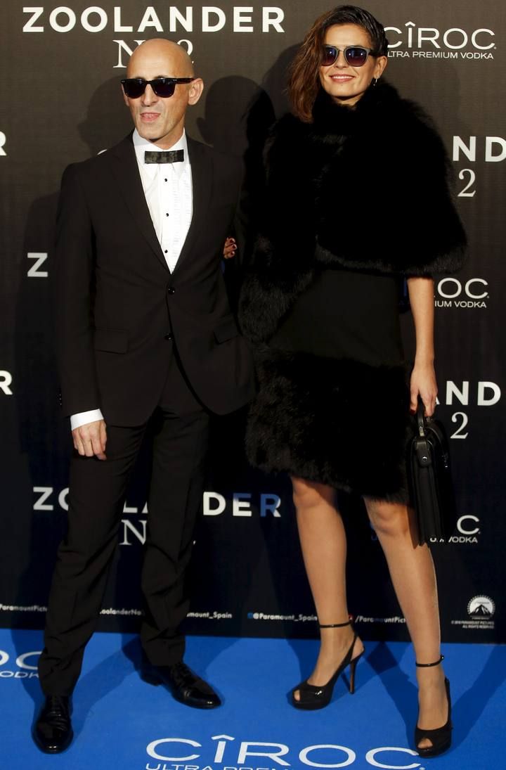 Spanish fashion designer Modesto Lomba and model Maria Reyes pose during a photo call before the fan screening of the film "Zoolander 2" in Madrid, Spain
