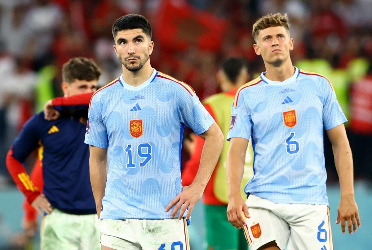 Carlos Soler y Marcos Llorente al final de partido.