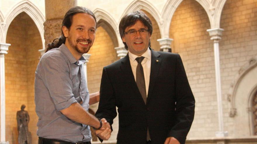 Puigdemont i Iglesias, en una reunió el 2016