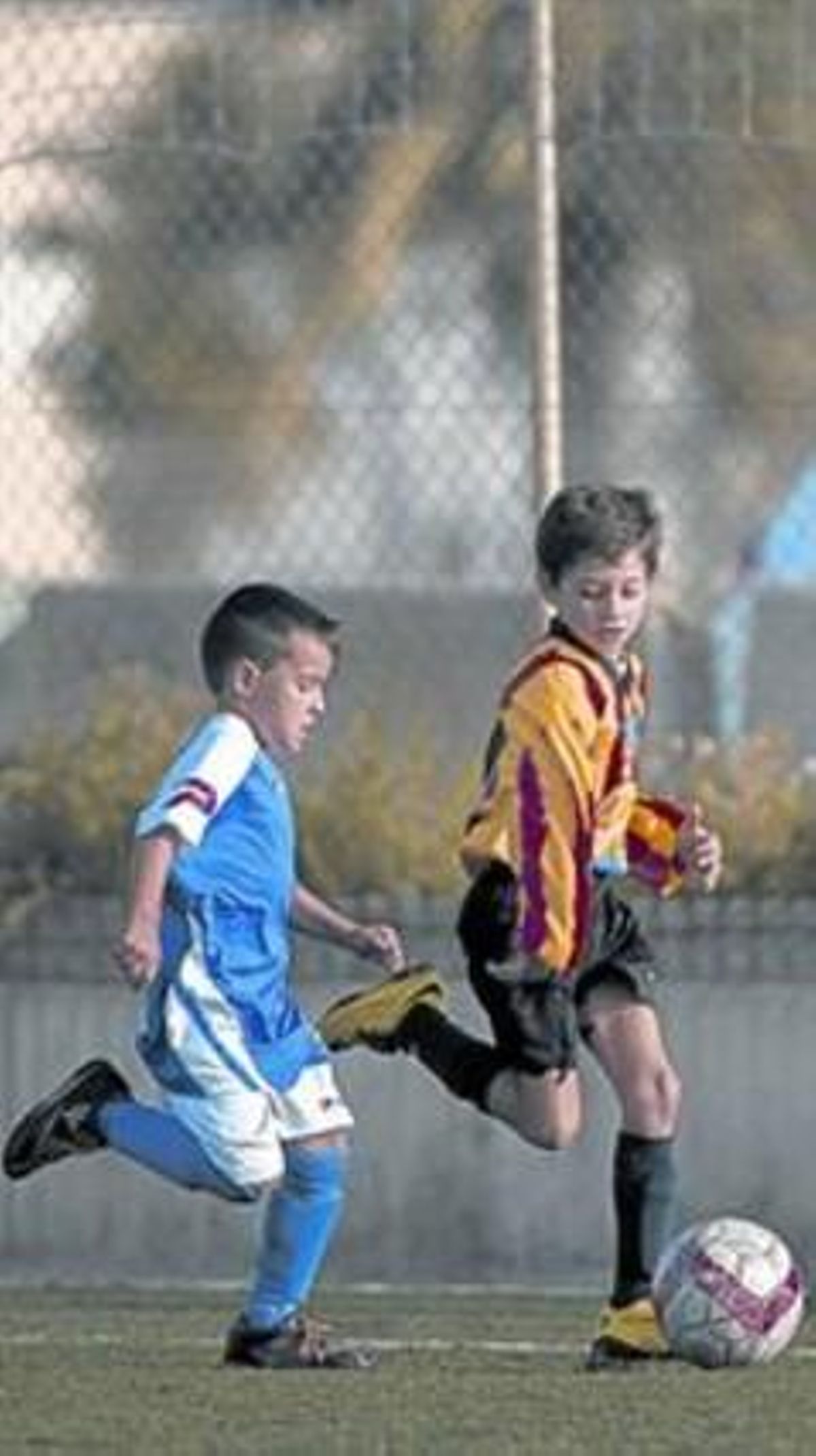 Partit de prebenjamins entre el Sant Andreu i el Vila Olímpica, a Barcelona.