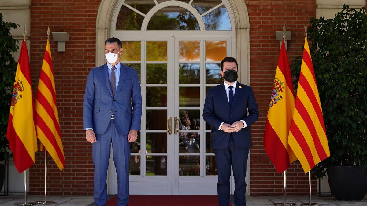 El presidente del Gobierno, Pedro Sánchez, y el de la Generalitat, Pere Aragonès