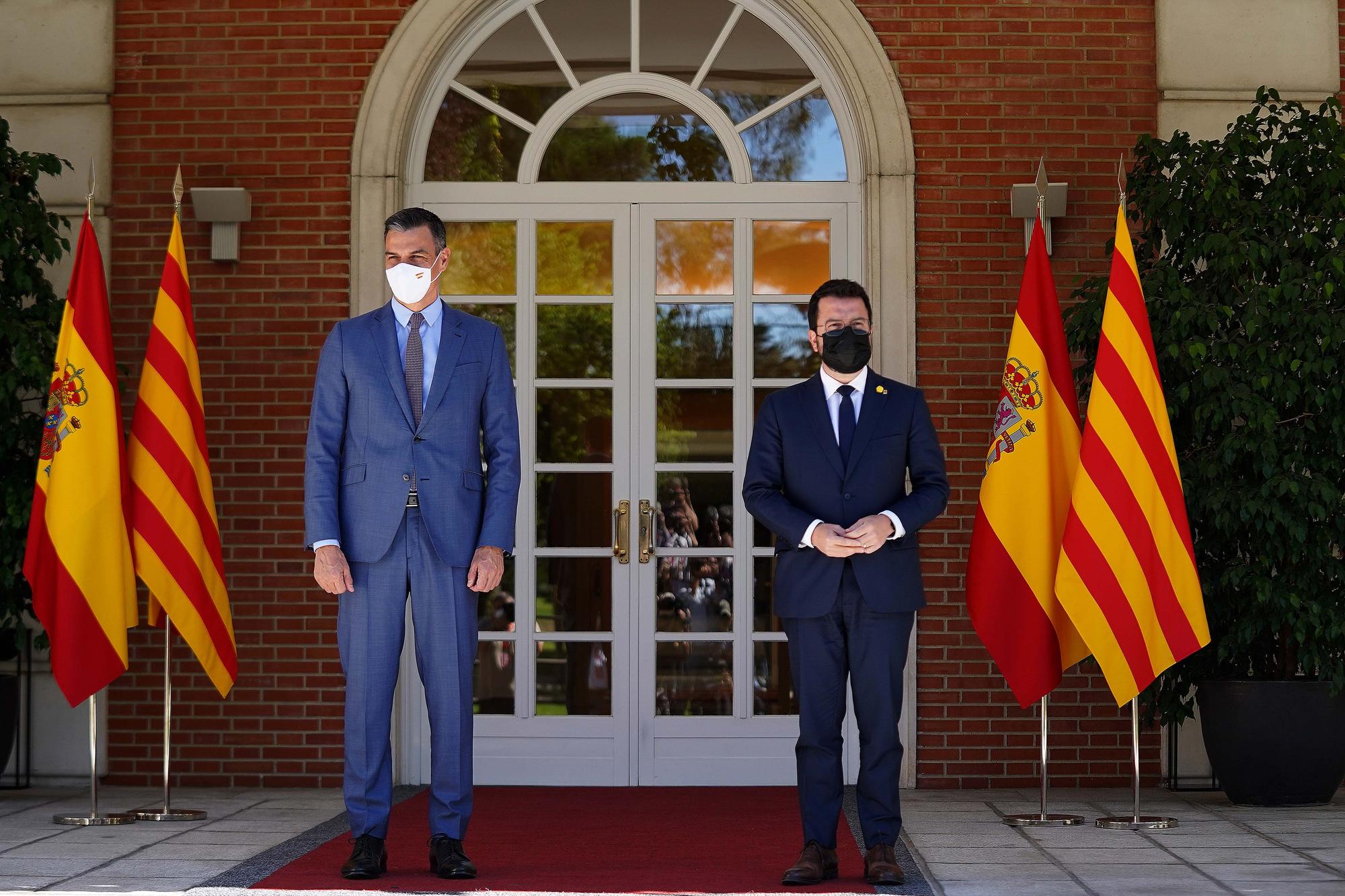 El presidente del Gobierno, Pedro Sánchez, y el de la Generalitat, Pere Aragonès