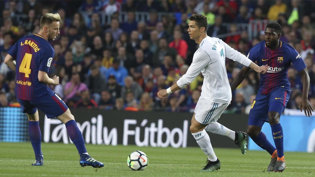Ivan Rakitic, Cristiano Ronaldo y Samuel Umtiti en el último Barça-Real Madrid de la Liga 2017/18