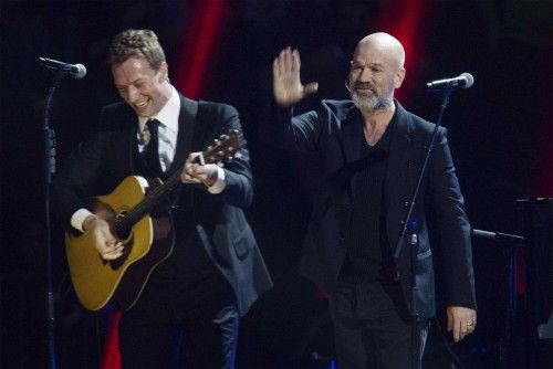 Singer Martin performs with Singer Stipe during "12-12-12" benefit concert for victims of Superstorm Sandy at Madison Square Garden in New York