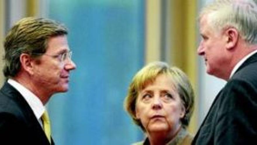 La coalición alemana cierrael laborioso pacto de Gobierno