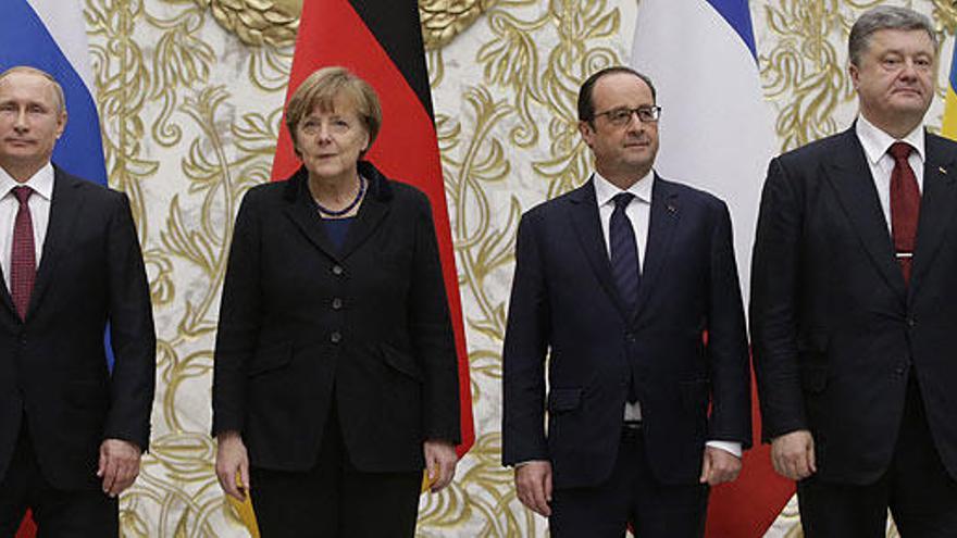 Putin, Merkel, Hollande y Porosheko, este jueves.