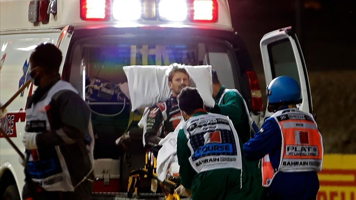 segea56040741 topshot medics attend to haas f1 s french driver romain gr201130160144 segea56040741 topshot medics attend to haas f1 s french driver romain gr201130160144