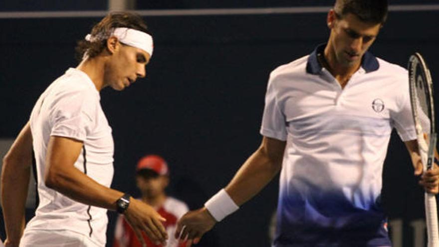 Nadal y Djokovic, en un encuentro de dobles.