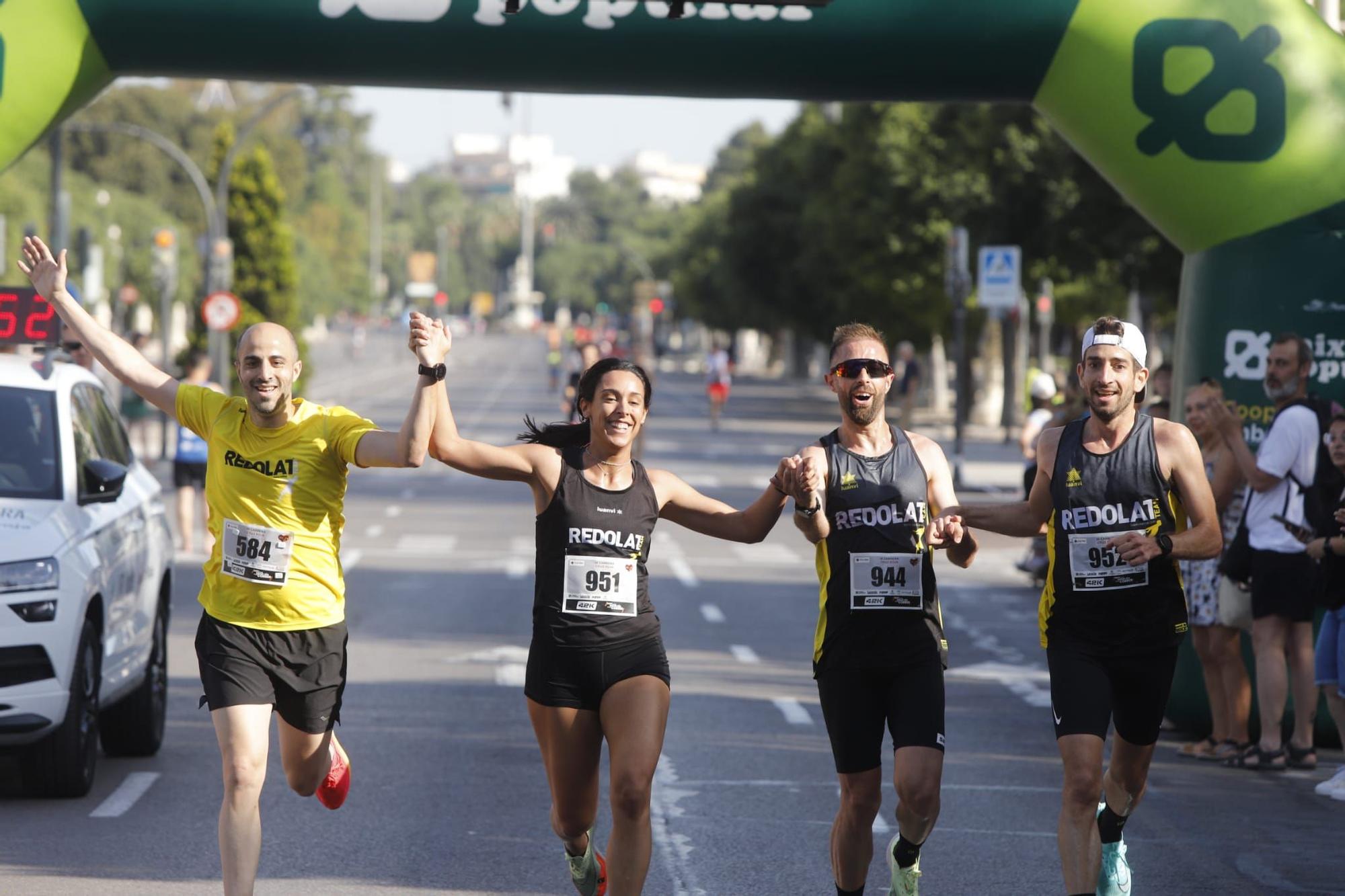 Miles de corredores en IX Carrera de Cruz Roja en València