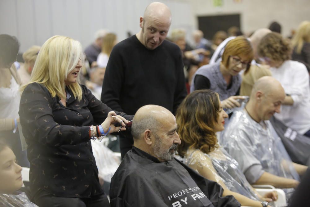 Corte de pelo simultáneo en València