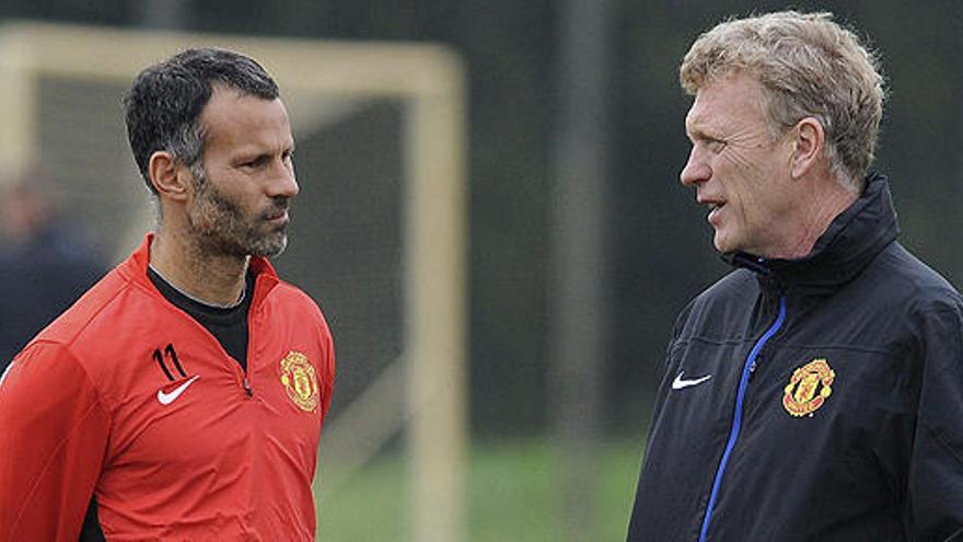 Ryan Giggs y David Moyes.