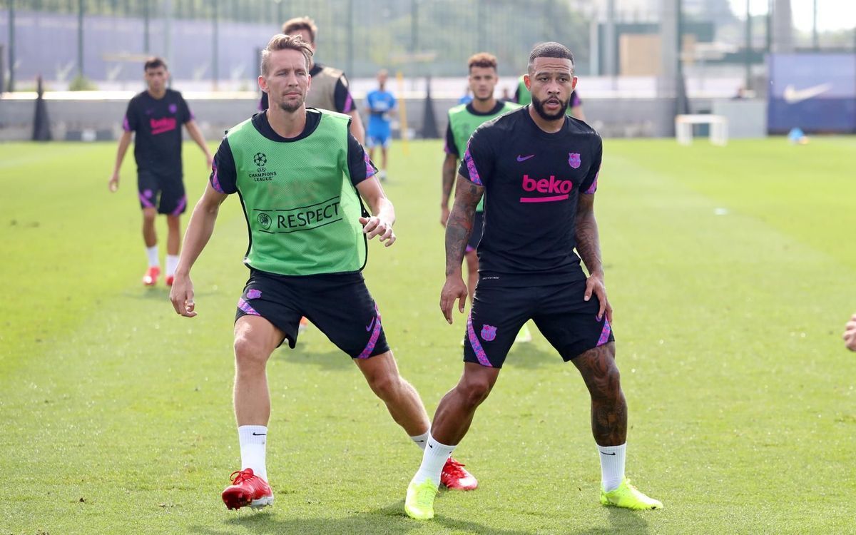 Luuk de Jong y Memphis, en el entrenamiento del Barça previo al duelo con el Bayern.