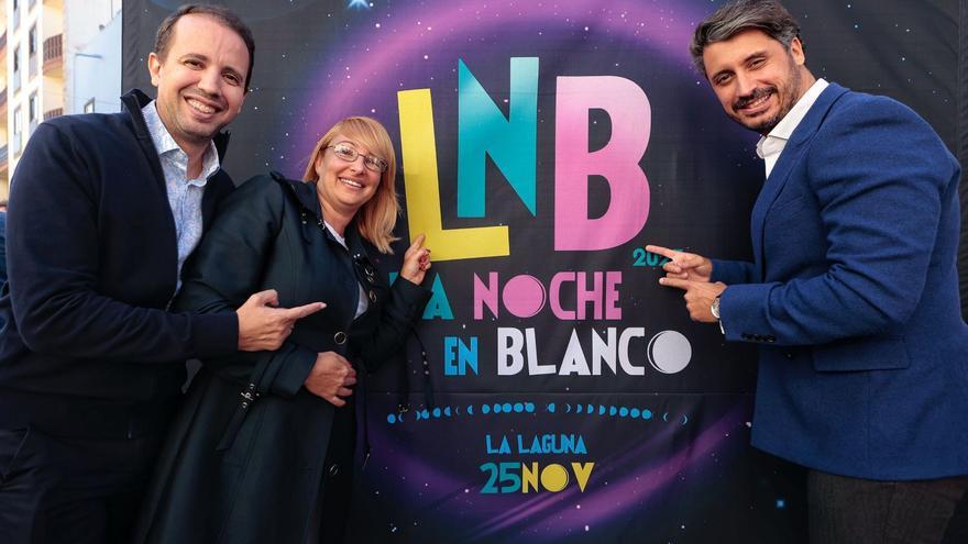Representantes municipales y comerciales señalan el logo de la Noche en Blanco.