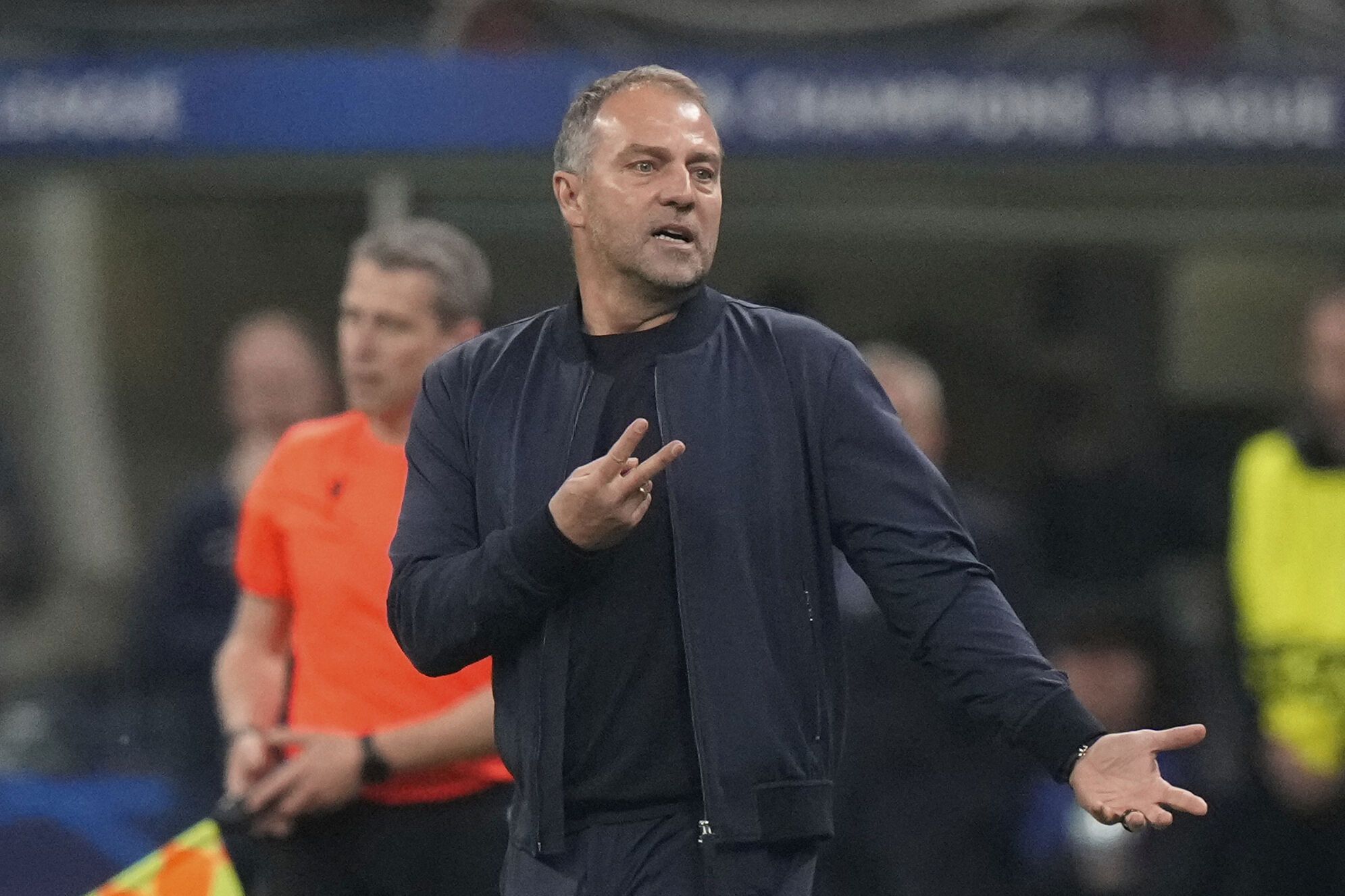 Barcelona's head coach Hansi Flick gestures during the Champions League semifinal second leg soccer match between Inter Milan and Barcelona at San Siro stadium in Milan , Italy, Tuesday, May 6, 2025. (AP Photo/Luca Bruno)
