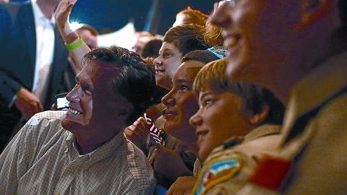 En campanya 8 Romney el sábado con un grupo de Boys Scouts en Apopka, Florida.