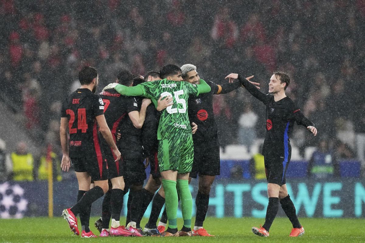 Barcelona players celebrate after a five-four win against Benfica, during a Champions League opening phase soccer match at the Luz stadium in Lisbon, Tuesday, Jan. 21, 2025. (AP Photo/Armando Franca)