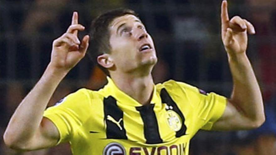 Lewandowski celebra sus goles al Madrid.