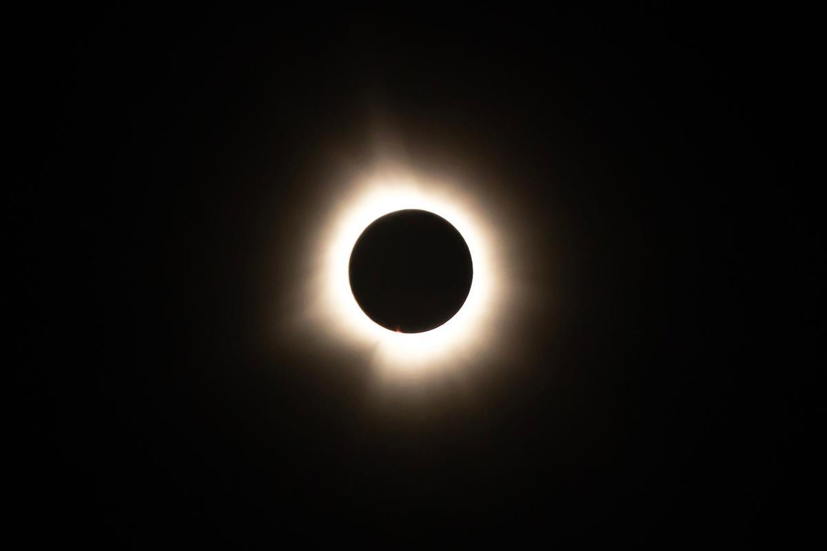 The moon passes in front of the sun during a solar eclipse seen from Bloomington, Indiana, US, on Monday, April 8, 2024. Today a total solar eclipse will occur across North America, the first to be visible on the continent since the frenzy of the Great American Eclipse of 2017. Photographer: Chet Strange/Bloomberg