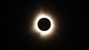 The moon passes in front of the sun during a solar eclipse seen from Bloomington, Indiana, US, on Monday, April 8, 2024. Today a total solar eclipse will occur across North America, the first to be visible on the continent since the frenzy of the Great American Eclipse of 2017. Photographer: Chet Strange/Bloomberg