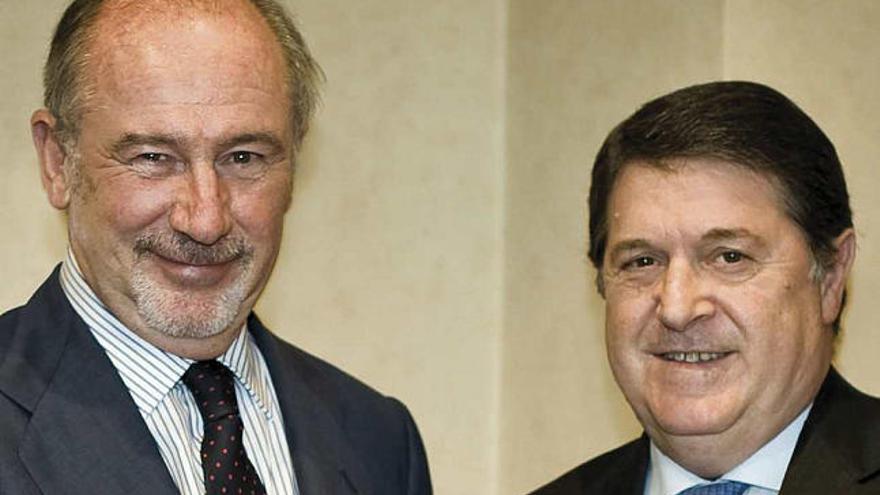 Rodrigo Rato y José Luis Olivas, tras el acuerdo alcanzado entre Caja Madrid y Bancaja.