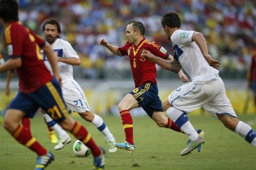 Italy's Maggio and Pirlo run near Spain's Iniesta during their Confederations Cup semi-final soccer match at the Estadio Castelao in Fortaleza