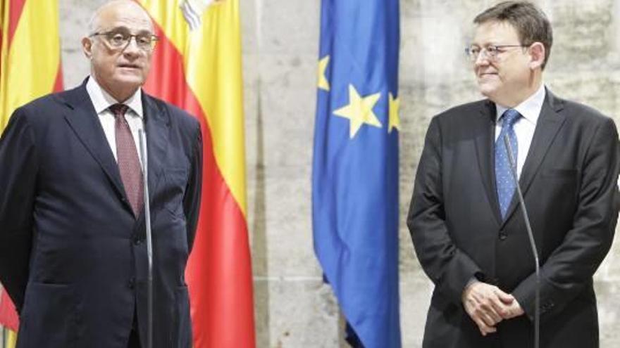 El presidente del Sabadell, Josep Oliu, junto al presidente de la Generalitat, Ximo Puig