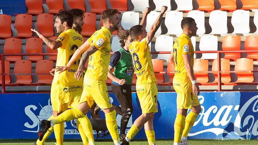 La celebración
del equipo tras
ganar el Lugo.  málagacf