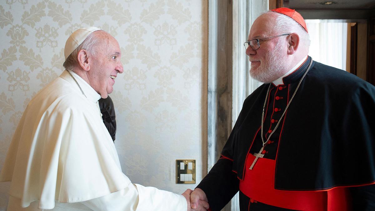(FILES) This file handout photo taken on February 03, 2020 by the Vatican Media shows Pope Francis (L) greeting chairman of the German Bishops' Conference, Archbishop of Munich and Freising, German Cardinal Reinhard Marx during a private audience at the Vatican. - One of Germany's leading Catholic bishops, Cardinal Reinhard Marx, said on June 4, 2021 that he had offered Pope Francis his resignation over the church's &quot;institutional and systemic failure&quot; in dealing with child sex abuse scandals. (Photo by Handout / VATICAN MEDIA / AFP) / RESTRICTED TO EDITORIAL USE - MANDATORY CREDIT &quot;AFP PHOTO / VATICAN MEDIA&quot; - NO MARKETING NO ADVERTISING CAMPAIGNS - DISTRIBUTED AS A SERVICE TO CLIENTS ---
