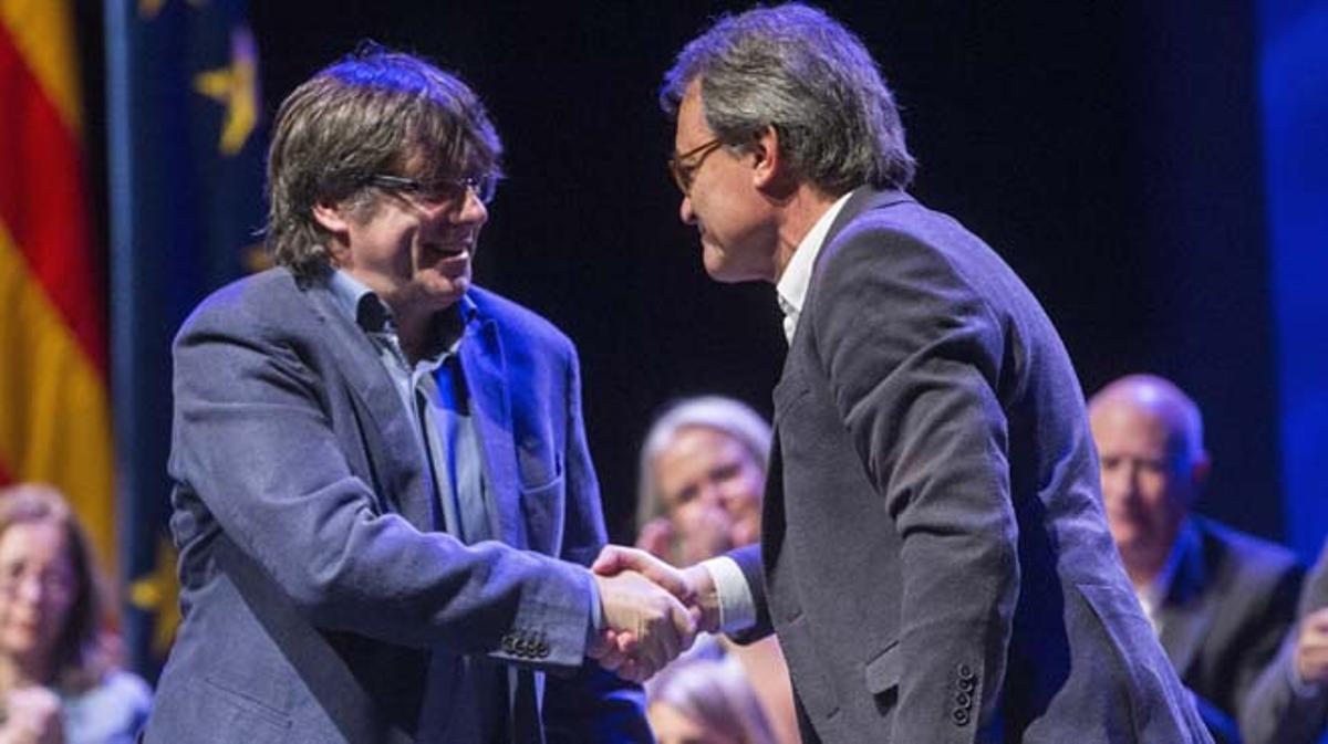 Carles Puigdemont  i Artur Mas durant la primera conferència ideològica celebrada pel partit.