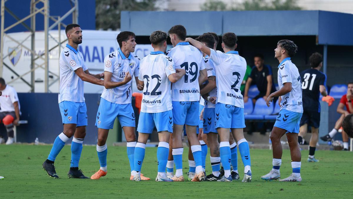 Los jugadores del Málaga CF celebran un gol durante la pretemporada.