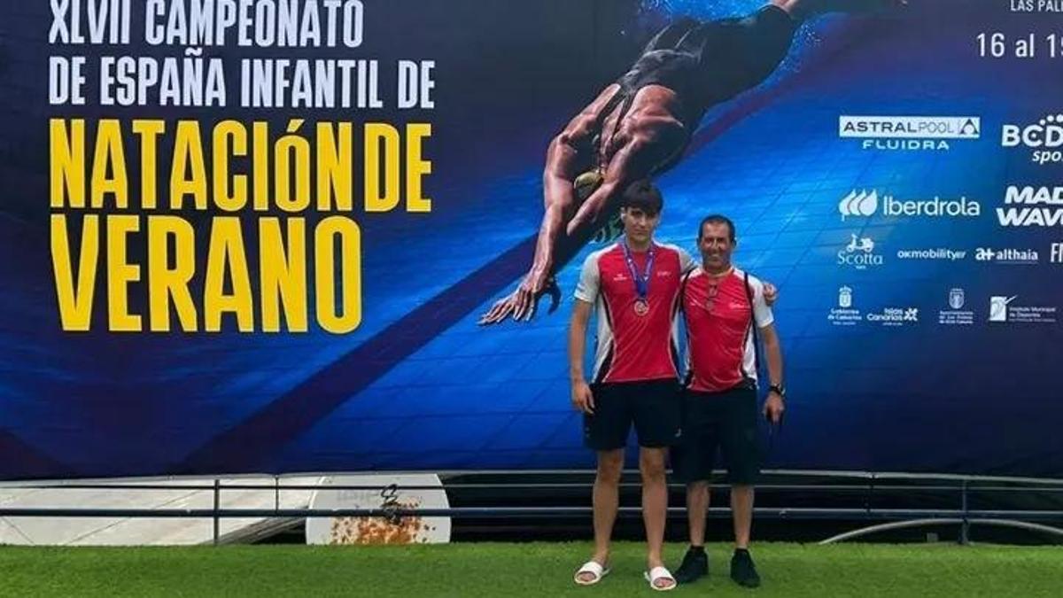 Marcos Garabatos y su entrenador.