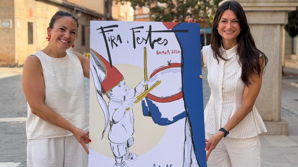 Autora y concejala muestran el cartel anunciador de la Fira i Festes de Gandia 2026