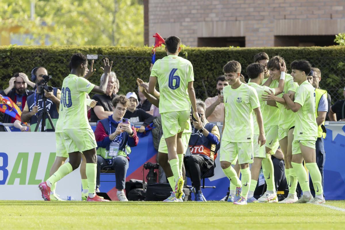 Barcelona's Andres Cuenca, 2nd right, celebrates after scoring during the UEFA Youth League Final match between Trabzonspor and Barcelona, at the Colovray Sports Centre in Nyon, Switzerland, Monday, April 28, 2025. (Salvatore Di Nolfi/Keystone via AP)