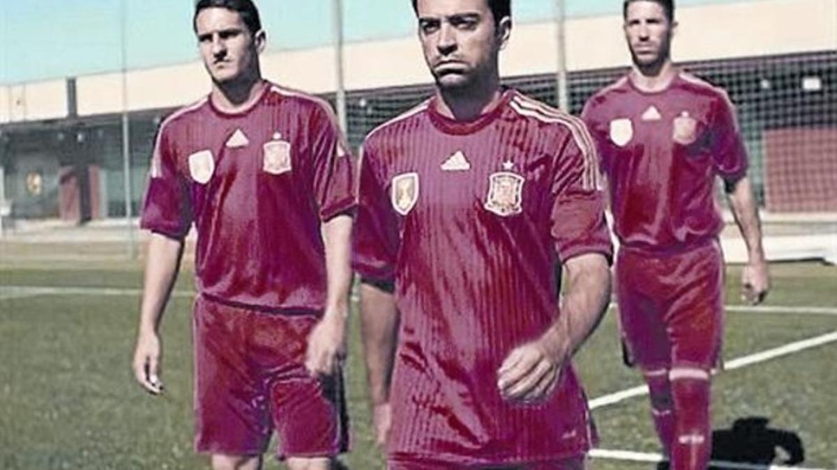 Koke, Xavi y Ramos 8 En un anuncio de Adidas.