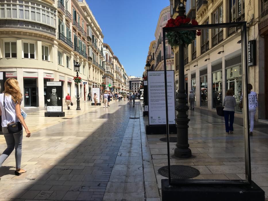 Daños en la exposición de la AECC en la calle Larios.