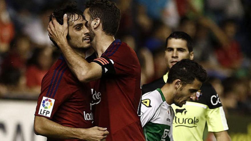 Arribas y Damiá celebran la victoria del equipo rojillo ante el Elche.