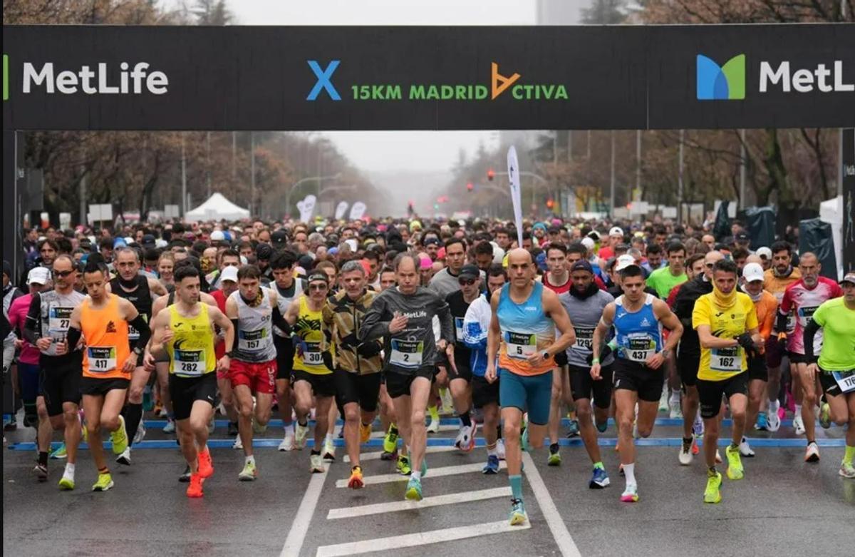 Reyes Estévez y Sara Reglero, ganadores de una 15km Metlife Madrid Activa de récord