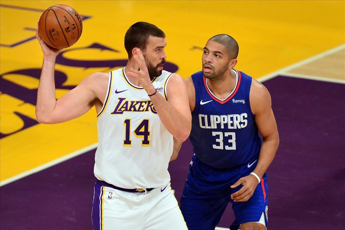 Dec 13  2020  Los Angeles  California  USA  Los Angeles Lakers center Marc Gasol (14) moves the ball against Los Angeles Clippers forward Nicolas Batum (33) during the first half at Staples Center  Mandatory Credit  Gary A  Vasquez-USA TODAY Sports