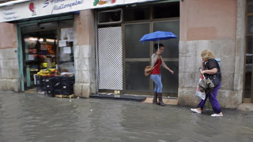 La calle Eusebio Estada, tras la tromba de agua.