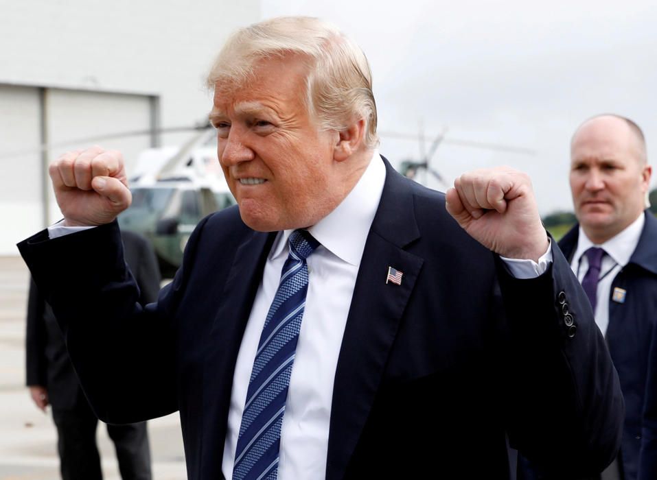 U.S. President Donald Trump gestures after ...