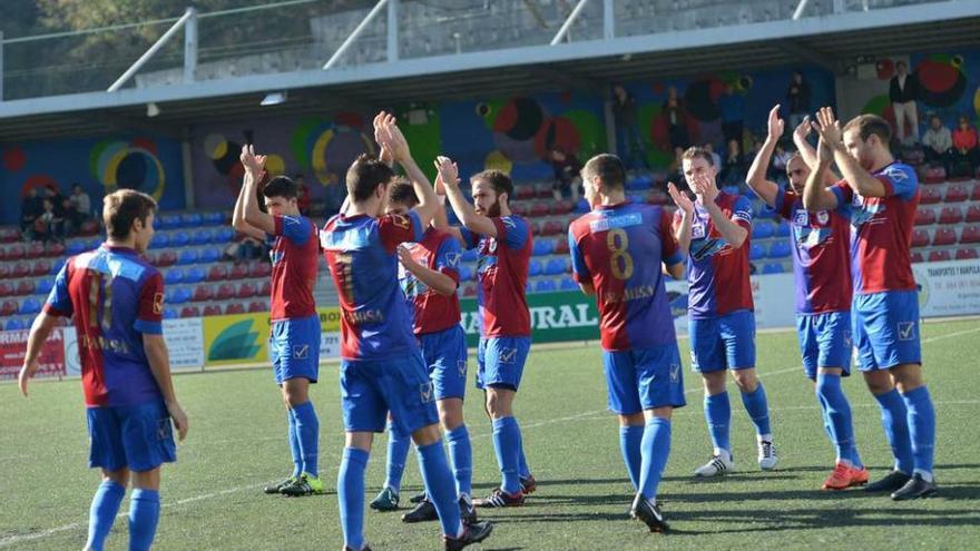 Los jugadores del Langreo, antes de un encuentro de la presente temporada.