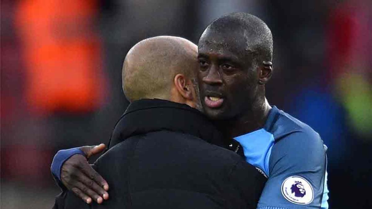 Yaya Touré, junto a Guardiola