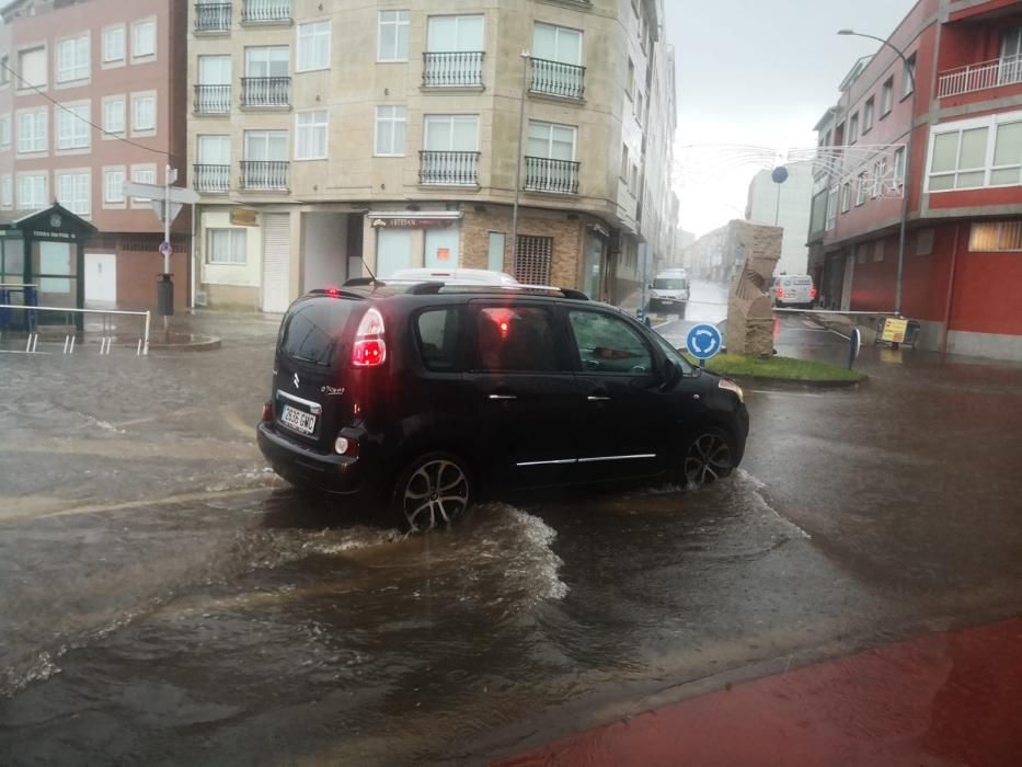 Los efectos de las intensas lluvias en O Grove.