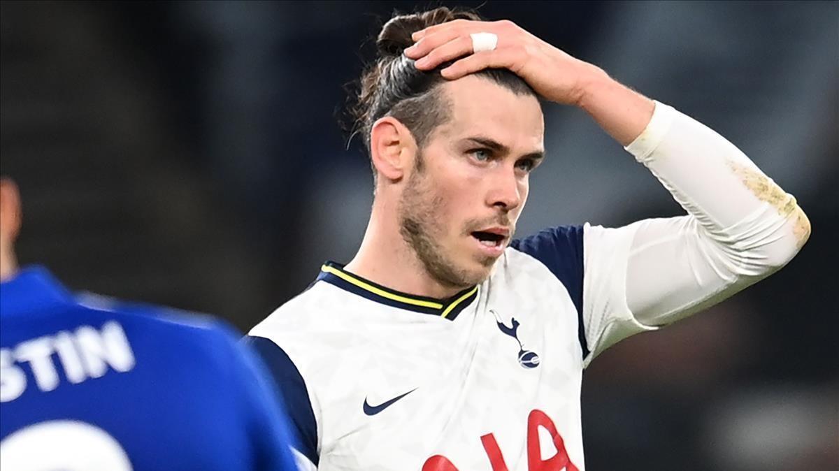 Tottenham Hotspurs Welsh midfielder Gareth Bale looks on during the English Premier League football match between Tottenham Hotspur and Leicester City at Tottenham Hotspur Stadium in London  on December 20  2020  (Photo by Andy Rain   POOL   AFP)   RESTRICTED TO EDITORIAL USE  No use with unauthorized audio  video  data  fixture lists  club league logos or  live  services  Online in-match use limited to 120 images  An additional 40 images may be used in extra time  No video emulation  Social media in-match use limited to 120 images  An additional 40 images may be used in extra time  No use in betting publications  games or single club league player publications