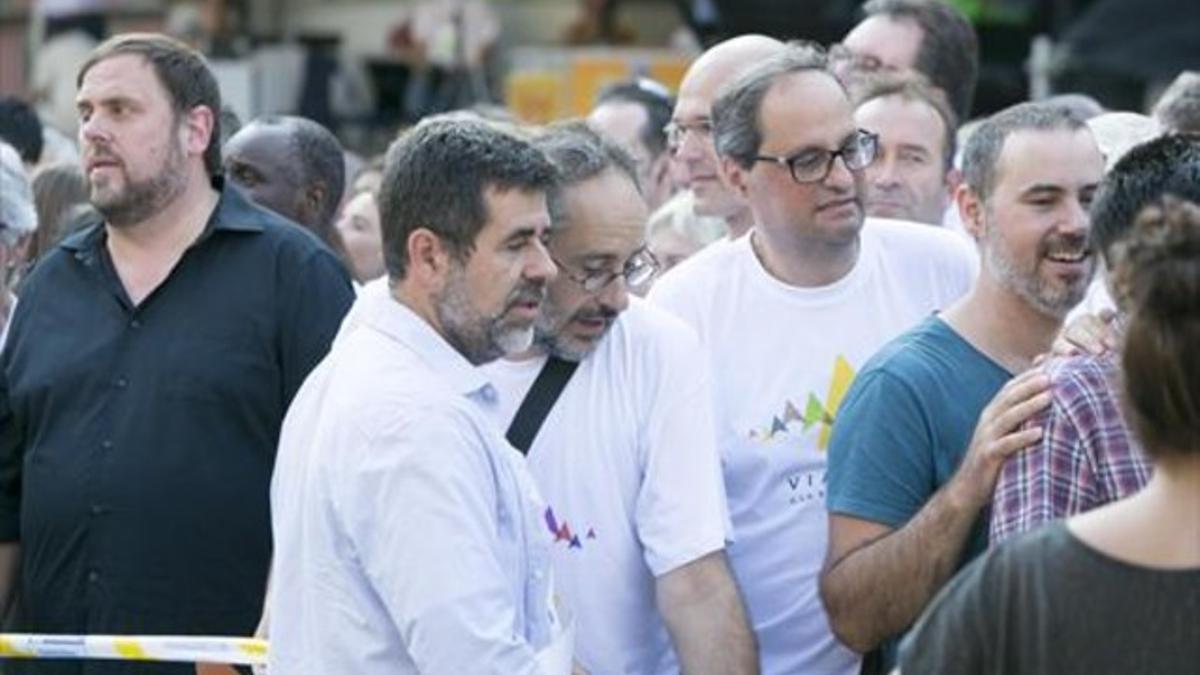 Jordi Sànchez, a Antonio Baños y Quim Torra, en la Via Lliure de la Diada del 2015.