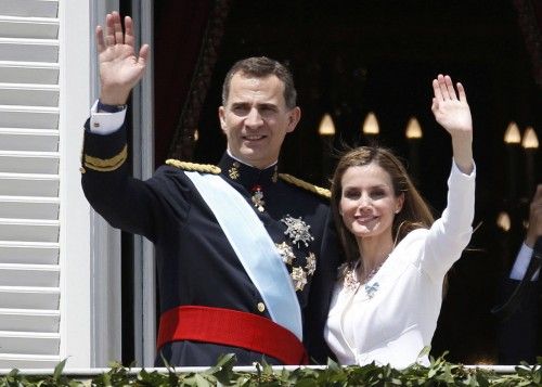 Spain's new King Felipe VI and his wife Queen Letizia appear on the balcony of the Royal Palace in Madrid