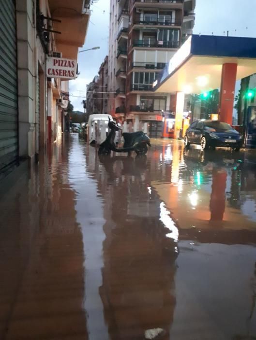 Consecuencias de las lluvias torrenciales caídas esta madrugada y esta mañana en Alzira.